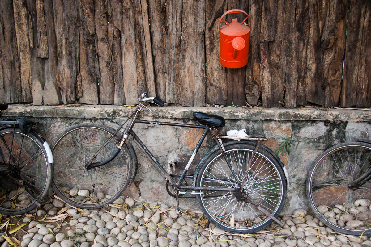 Red Watering Can and Bikes